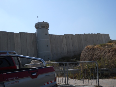 The apartheid wall with watch tower - photo taken during a visit in September