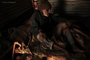 “Why?” He ask with a shrug of his shoulders. An old man is unable to walk, and lays helplessly while those around him move their own belongings out of their homes. People would come to help him move, but like many, he had nowhere to go either