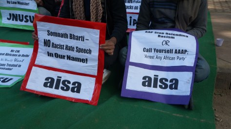 SIGNS AT ANTI RACISM PROTEST IN JANTAR MANTAR