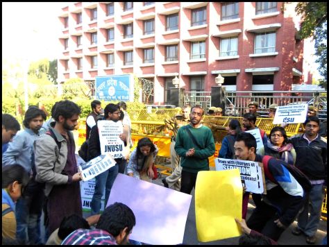 A student activist addresses the gathering