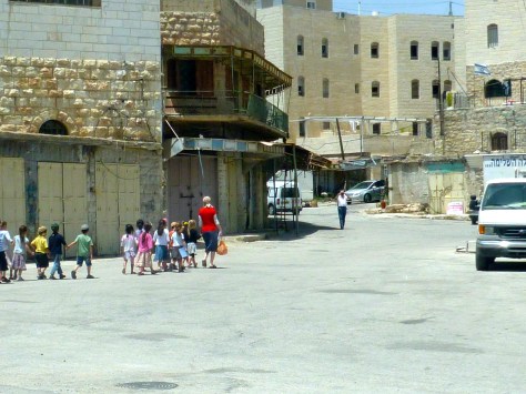 Children of Settlers being Escorted to Kindergarten through Empty Streets