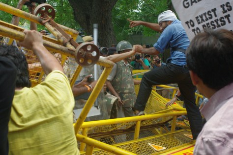 JNU Students Trying to Cross Barricades Put Up by Delhi Police to Prevent them from reaching the Road in front of the Israeli Embassy in Delhi. 14th July, 2014